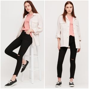 Ultra-stretched distressed skinny jeans black